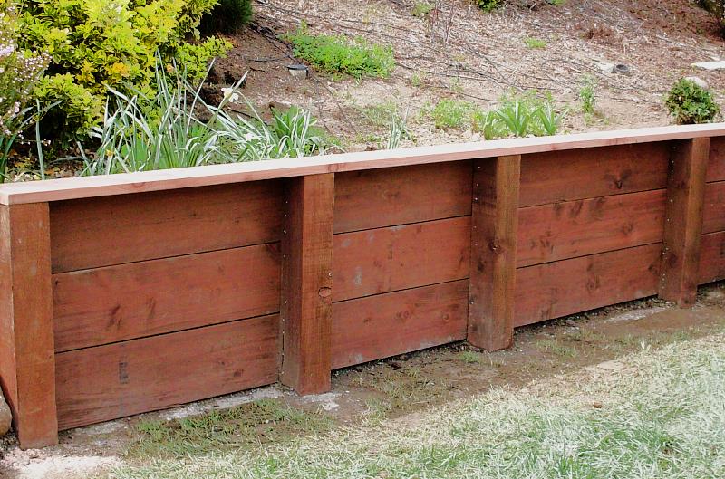 How to build a wood retaining wall on a slope