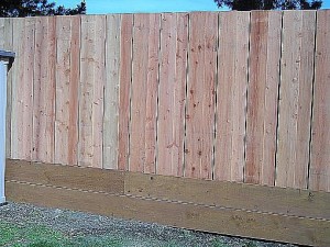 nail on flat top redwood fence