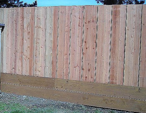 nail on flat top redwood fence